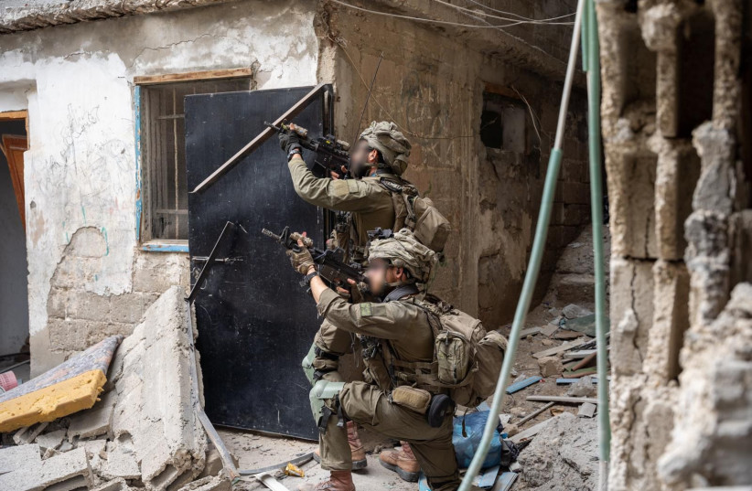  IDF troops on the ground in Khan Yunis, Gaza, February 25, 2024 (credit: IDF SPOKESPERSON'S UNIT)