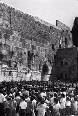 Kids gather at the Western Wall to pray after the call of the Rebbe, Rabbi Menachem Mendel Schneerson, of righteous memory.